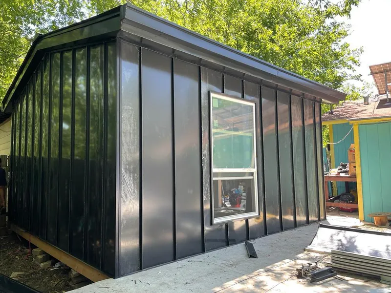 Black standing seam metal wall panels for Roof Inspection in Brevard