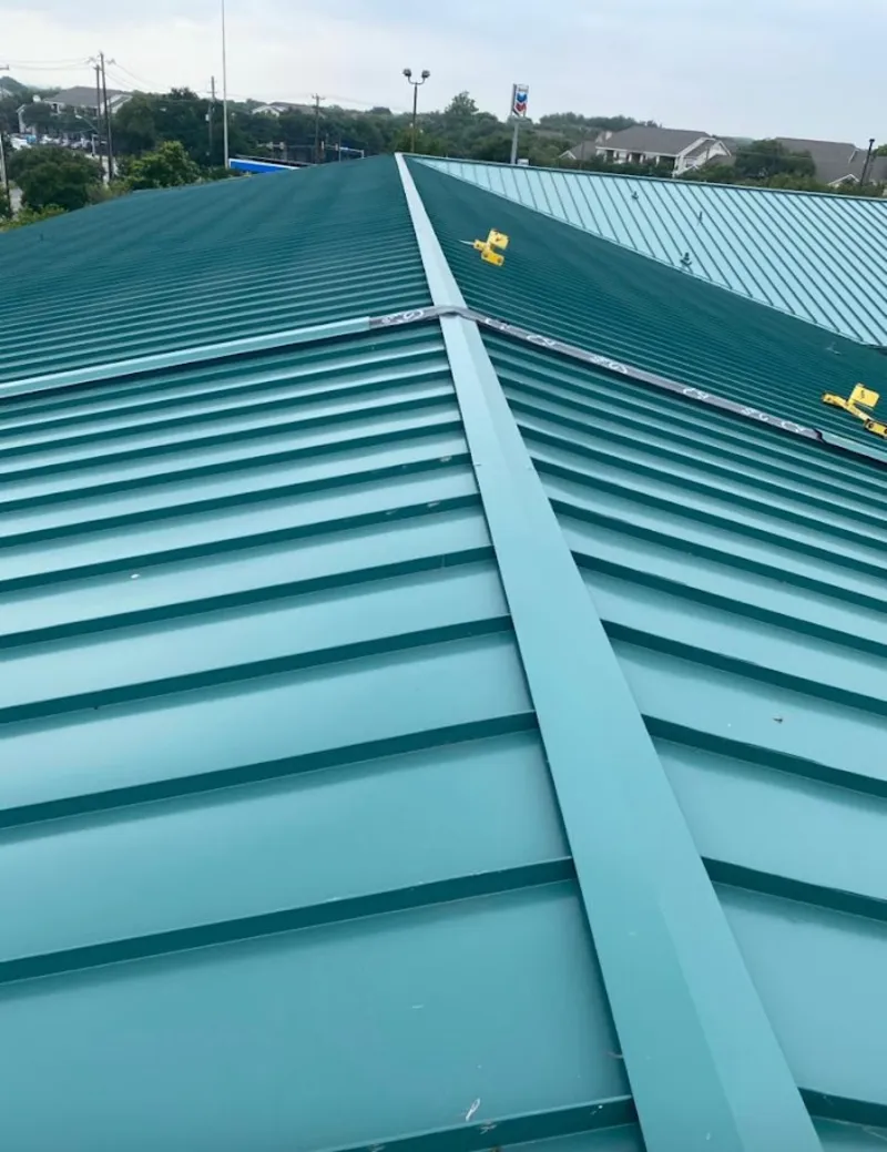 Green commercial metal roof ridge and valley for Metal Roof Repair in Brevard